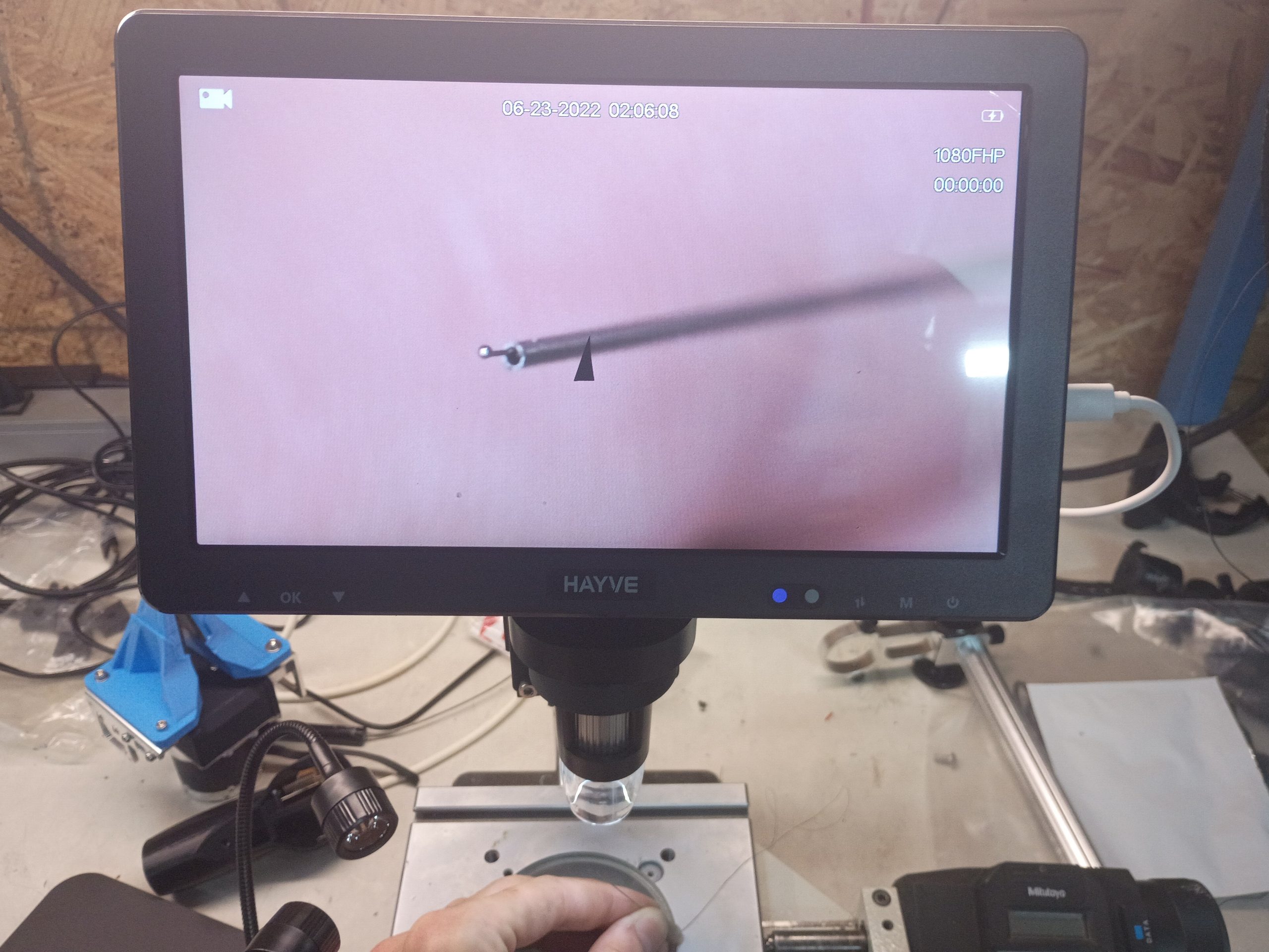 Needle under microscope
